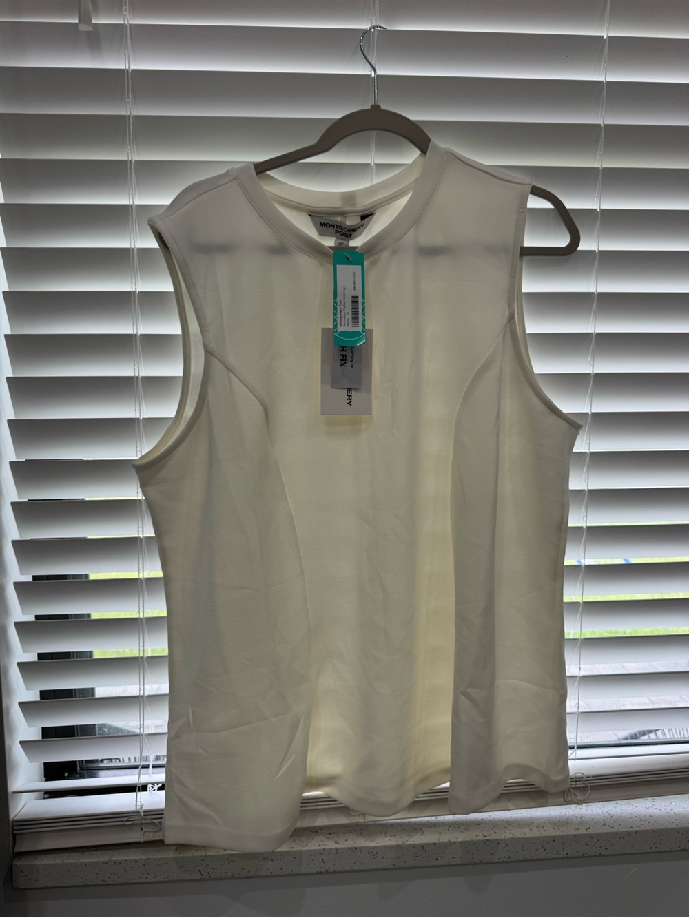 Women's Sleeveless White Shell Top